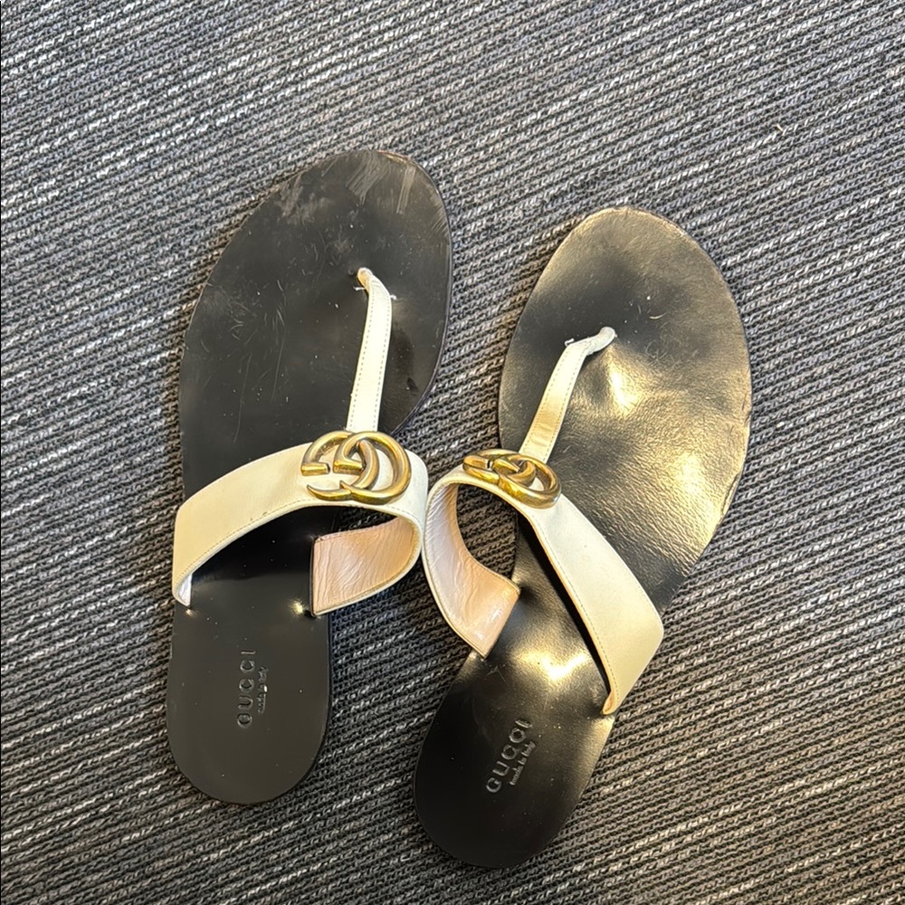 Gucci Black and Gold Sandals with Minimalist Design